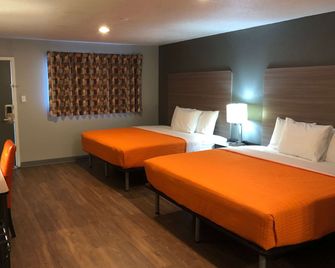 Super 8 by Wyndham Sonora - Sonora - Schlafzimmer