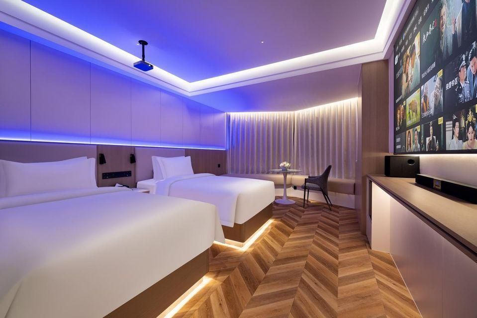 Gloria Plaza Hotel - שניאנג - חדר שינה