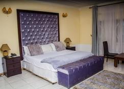 Rugems Executive Lodge - Lusaka - Bedroom