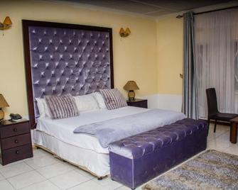 Rugems Executive Lodge - Lusaka - Bedroom