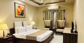 Grand Regent Hotel and Suites - Faisalābād - Habitación