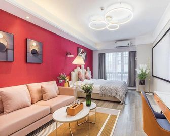 Light luxury hotel - נאנז'ינג - חדר שינה