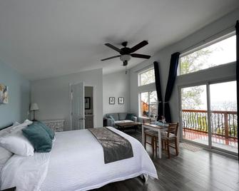 Knotty Pine Cottages - Ingonish Beach - Habitación