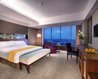 Aston Madiun Hotel & Conference Center - Madiun - Slaapkamer