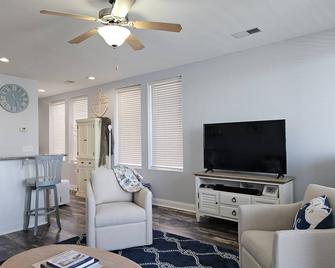 Water view condo overlooking Marina, with private deck - Southport - Living room