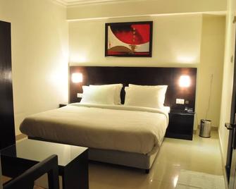 Anr Hotels - Lucknow - Bedroom