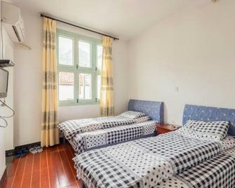 Qingyuan Farm Stay - Huangshan - Sypialnia