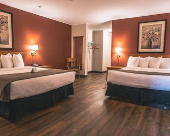 Quality Inn & Suites - Saskatoon - Bedroom