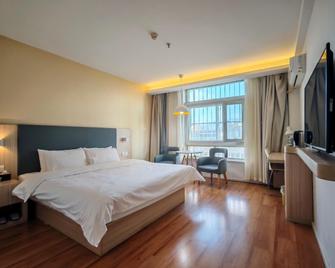 Hanting Hotel Xining Huangguang - Ксінін - Спальня