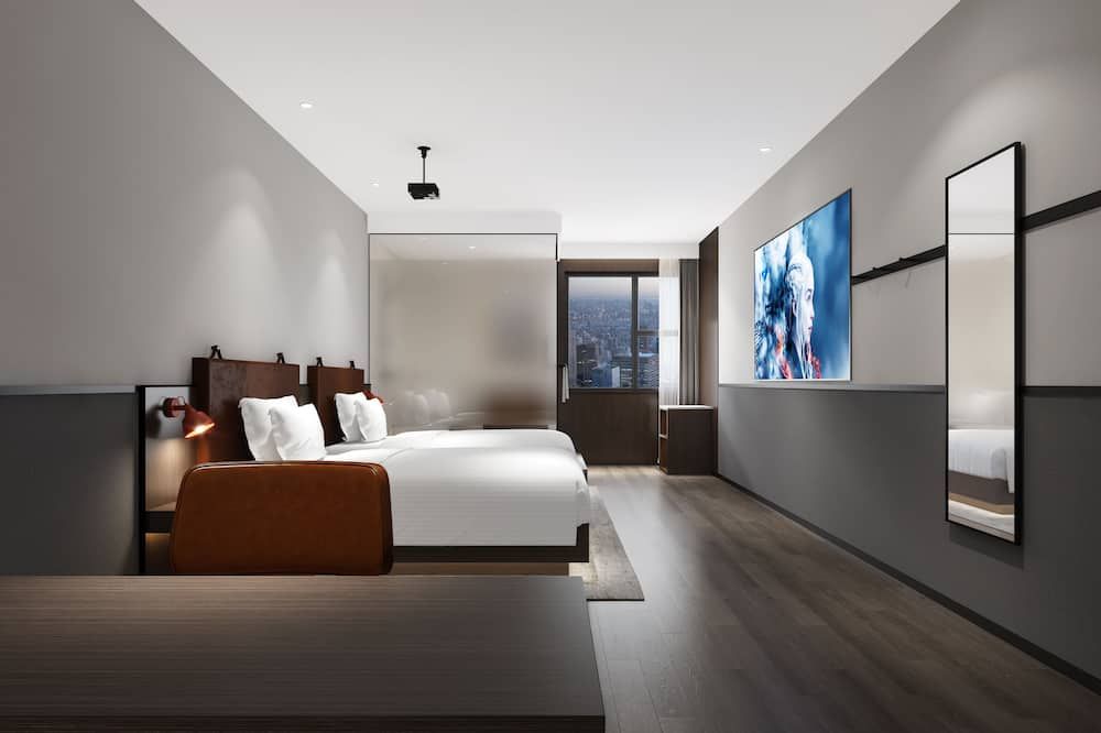 م ي آا و تش هوتتل جويانج كياوشيزي - قوييانغ - غرفة نوم