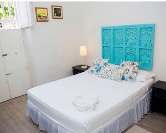 Habitacion de hotel CR-1M en Getsemani con aire acondicionado y wifi - קרטחנה דה אינדיאס - חדר שינה