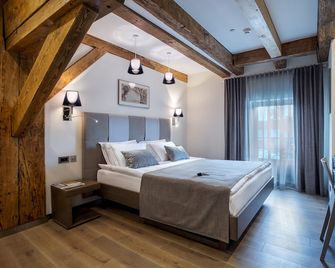 Michaelson boutique Hotel - קלאיפדה - חדר שינה