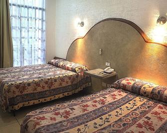 هوتل فينيكس - تاباتشولا - غرفة نوم