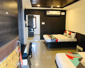 Wishotel Xpress 7 Eleven - Indore - Slaapkamer