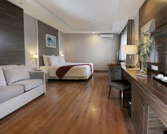 Pranaya Boutique Hotel - Tangerang City - חדר שינה
