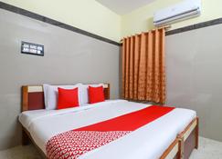 Spot On Raja Lodge - Tiruvannāmalai - ห้องนอน