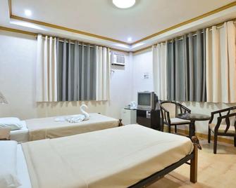 Amax Inn Makati - מאקאטי סיטי - חדר שינה