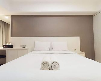 Modern Look Studio Apartment at Marquis de Lafayette By Travelio - Semarang - Bedroom