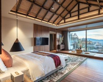Tengchong Ruili Hot Spring Scenic Hotel - Baoshan - Schlafzimmer