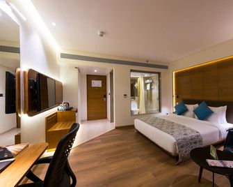 The Fern Residency Jamnagar, Series by Marriott - Jamnagar - Schlafzimmer