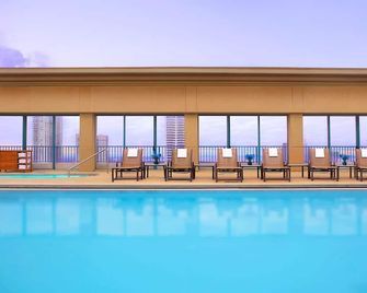 2 Connecting Suites with Three Beds at a 4 Star Hotel by Suiteness - Jacksonville - Piscina