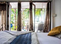 Cafe Del Mar Cottages And Rooms - Palolem - Chambre