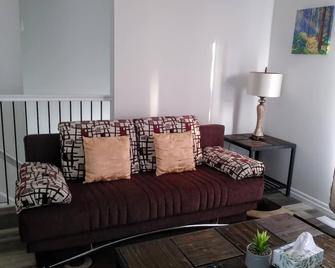 Relax and enjoy your home away from home. - Strathroy - Living room