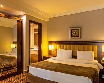 أجنحة لانكستر - بيروت - غرفة نوم