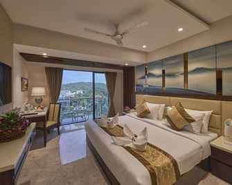 ريجينتا سنترال إمبيريال كاندوليم جوا - موروغوا - غرفة نوم