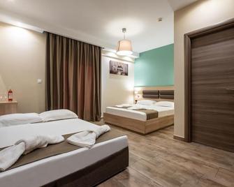 Lagaria Luxury Rooms & Apartments - Asprovalta - Schlafzimmer