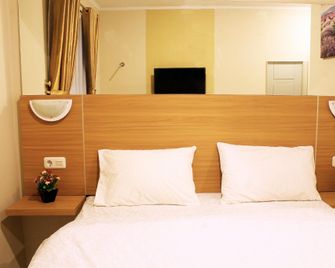 C Hotel Cirebon - Cirebon - Bedroom
