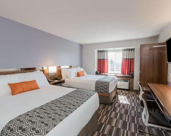 Microtel Inn & Suites by Wyndham Tioga - Tioga - Bedroom