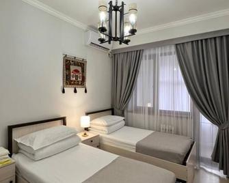 كومباس هوستل سيديكوفا - بيشكيك - غرفة نوم