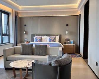 Ningbo World Hotel - Ningbo - Slaapkamer
