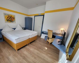 City Hotel - Delmenhorst - Schlafzimmer