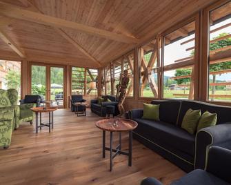 Relais & Châteaux Gut Steinbach Hotel Chalets Spa - Reit im Winkl - Living room