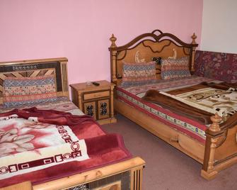 Hotel Cedar Inn - Mānsehra - Bedroom