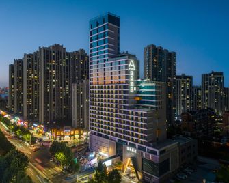 Shiyan Dm International Shanghai Road Atour Hotel - Shiyan - Edificio