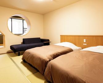 Ooedo Onsen Monogatari Premium Yamanaka Grand Hotel - Kaga - Bedroom