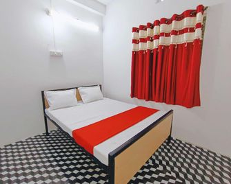 Spot On 80770j Hotel Relax Inn - Chandrapur - Bedroom