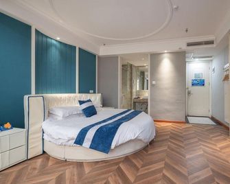 Ganzhou Sofina Hotel - Ganzhou - Bedroom