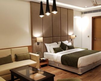 Orchid Blu - Alīgarh - Bedroom