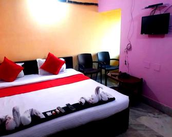 Goroomgo Ashok Royal Puri - פורי - חדר שינה