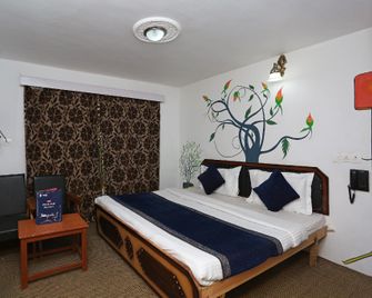 OYO Flagship Hotel Palace Pahalgam - Pahalgam - Bedroom