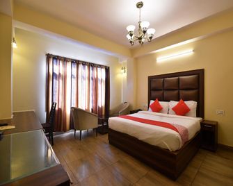 OYO 10942 Home Inn - Shimla - Makuuhuone