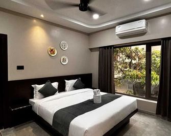 Park Abode Boutique Guest House - Gauhati - Schlafzimmer