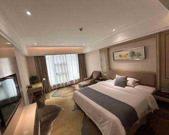 Xinyuan Hotel Wanzai - Yichun - Habitación