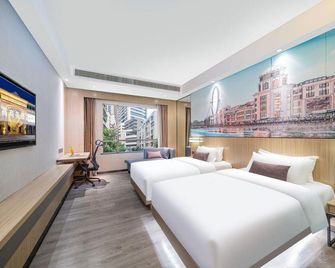 Zhongshan Tegao Business Hotel - ג'ונגשאן - חדר שינה