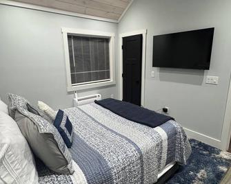 Enjoy a stylish experience at this centrally-located place. - Ticonderoga - Bedroom
