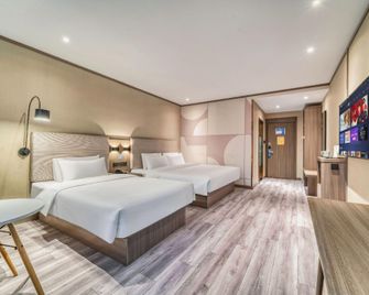 Hanting Hotel Heze Zhongshan Road Wanda - Heze - Camera da letto